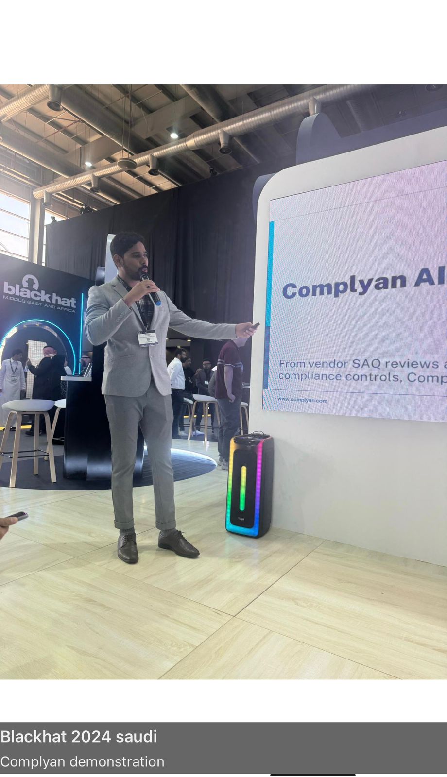Umar speaking at Black Hat MEA 2024 — Complyan AI demonstration